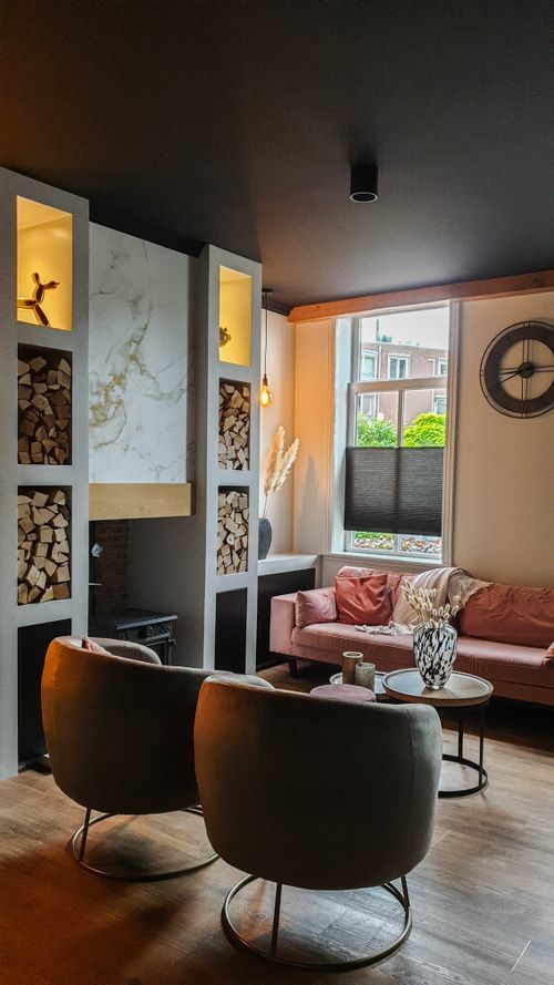 Warm modern living room with layered lighting and refined finishes